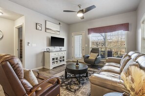 Curl up in the cozy living room & stream your favorites on the smart TV
