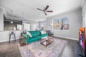 As you take a seat in the living room, the comfortable furniture and tasteful design make it easy to unwind.