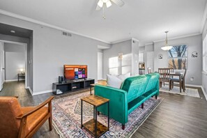 Once you enter the living room you'll find a space that feels both luxurious and cozy, perfect for unwinding after a long day.
