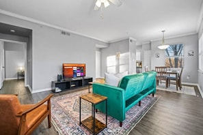 Once you enter the living room you'll find a space that feels both luxurious and cozy, perfect for unwinding after a long day.