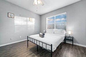 The bedroom offers a sanctuary of calm, where you can unwind and recharge in comfort and style.