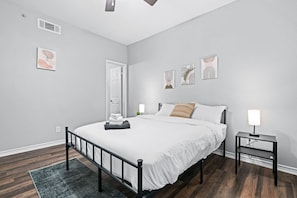 The bedroom offers a sanctuary of calm, where you can unwind and recharge in comfort and style.