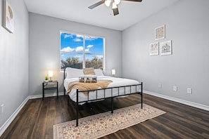The bedroom offers a sanctuary of calm, where you can unwind and recharge in comfort and style.