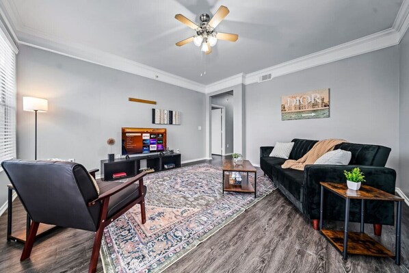 Upon entering, you find a space that feels both luxurious and cozy, perfect for unwinding after a long day.