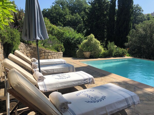 Sun loungers poolside