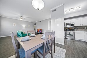 The spacious dining room invites you to savor every moment, whether enjoying a quiet meal or hosting a festive gathering.