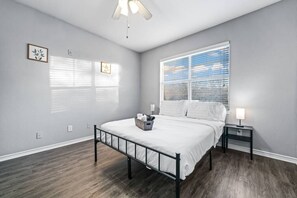 Spacious bedroom with stylish decor, perfect for unwinding after a day of exploring the local area.