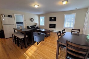 Open-concept apartment with Living room, kitchen, and dining area