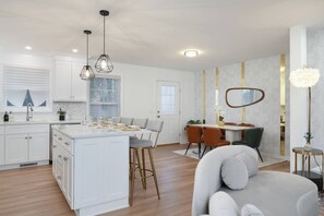 View of Kitchen Island and Dining Area