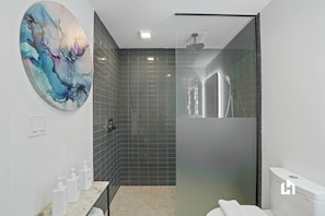 Chic bathroom with walk-in shower.