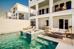 Pool and hot tub with a private boardwalk to the beach