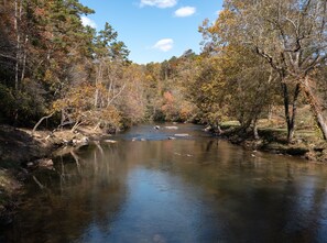 Relax on the back deck as you listen to the Cartecay River gently roll by  