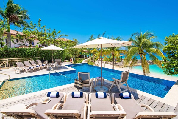 Casa Luna's communal pool deck features an elevated infinity pool plus a heated spa. 
