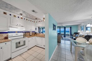 The fully equipped kitchen features granite countertops and has everything you need to prepare meals for family & friends.