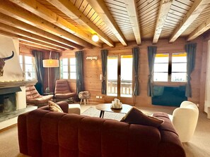 sunny living room with fire place 