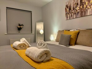 Your Cozy Getaway Awaits, Relax and Sleep Soundly in this Bedroom. Book Your Stay Now! (4)