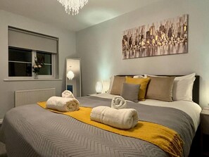 Your Cozy Getaway Awaits, Relax and Sleep Soundly in this Bedroom. Book Your Stay Now! (2)