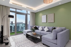Spacious living room designed for comfort, with ample seating