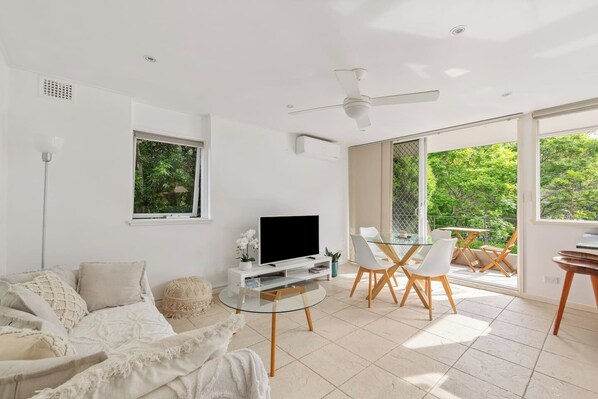 Offering a seamless open flow, this adorable apartment maximises space and natural light.