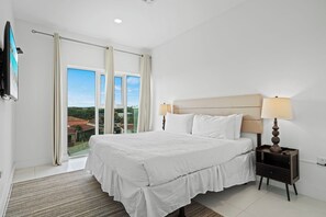 Bedroom 1 offers plenty of natural light and a king size bed