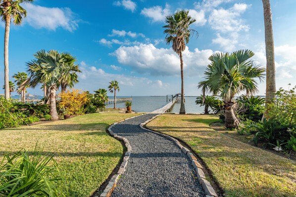 Welcome to the pathway to Paradise! This path leads to the bay & fishing dock.