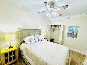 Queen bedroom. Dresser, extra, pillows, and pack n play crib in closet.