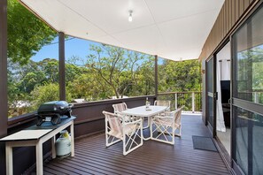 Deck with BBQ and outdoor dining