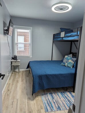 Comfy queen bed with twin above. Great for kids or a couple! Has TV &ceiling fan