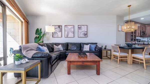 The living room is comfortable in this newly remodeled condominium.