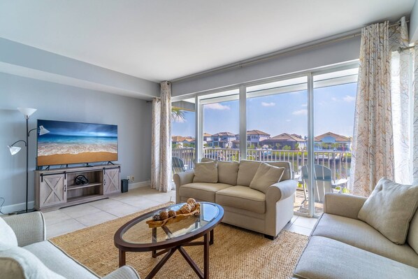 Main living area (second floor) with incredible canal views!