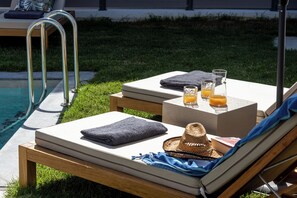 KS Si Villa - Outdoor space with swimming pool, seating area and BBQ facilities
