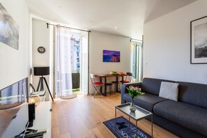 Bright and modern living room with balcony