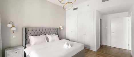 Bedroom: Experience chic comfort with stylish decor and modern features!
