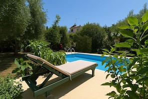 Relaxing by the pool