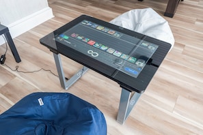 Infinity table - a game table that comes with a variety of games to play.