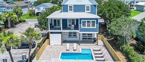 Experience a private pool and plenty of games at ou 7-Bedroom House right across from the beach!