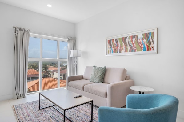 Living room with wall mounted flat screen smart TV