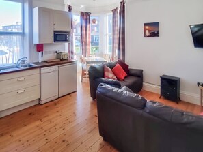 Open plan living space | Treasure Cove - Argyle Retreats, Whitby