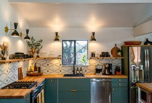 "This is one of the best properties I’ve stayed in through Airbnb! The interior details were beautiful and carefully thought out. The kitchen has any appliance you could think of and extras like a tea drawer, spices, and other kitchen essentials." Ashlie