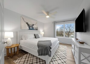 Master bedroom with King size bed, smart tv and ensuite bathroom