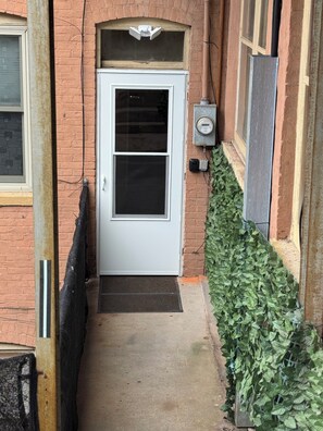 Main apartment door for check-in and check-out.