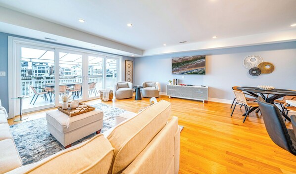 Bright Open-Concept Living Space with Balcony Views