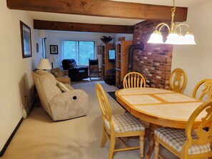 Kitchen to living area.   Living are has air conditioning and a 40-inch flat screen TV.