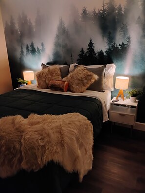 Pine forest bedroom with queen sized bed