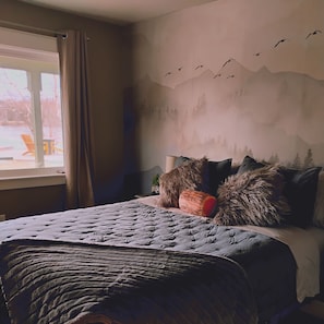 Mountain bedroom with queen sized bed and adjustable base bed frame