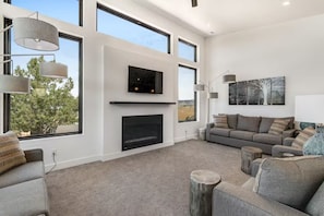 Large living room with a Roku Smart TV