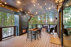 Private deck: Dining table, gas fireplace