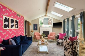 Thoughtfully Designed, Open Concept Living Area with Fireplace and Smart TV
