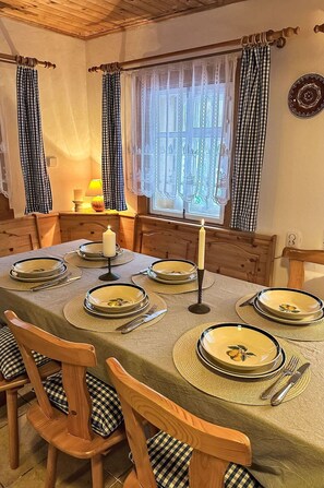 Furniture, Wood, Interior Design, Tableware, Kitchen & Dining Room Table, Flooring, Table, Dining Room, Chair, Serveware