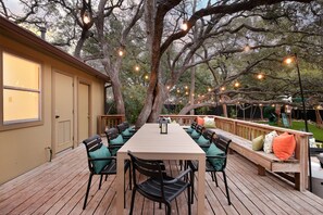 Gather under the open sky—outdoor dining for 10, plus extra seating to keep everyone together and comfortable.